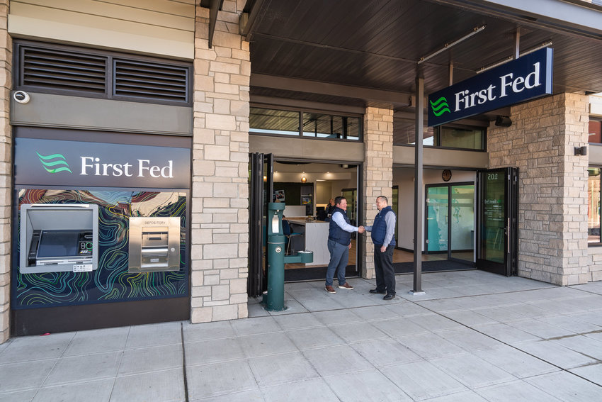First Fed CEO Matt Deines welcomes CLO Chris Neros at the Fairhaven branch of First Fed. 