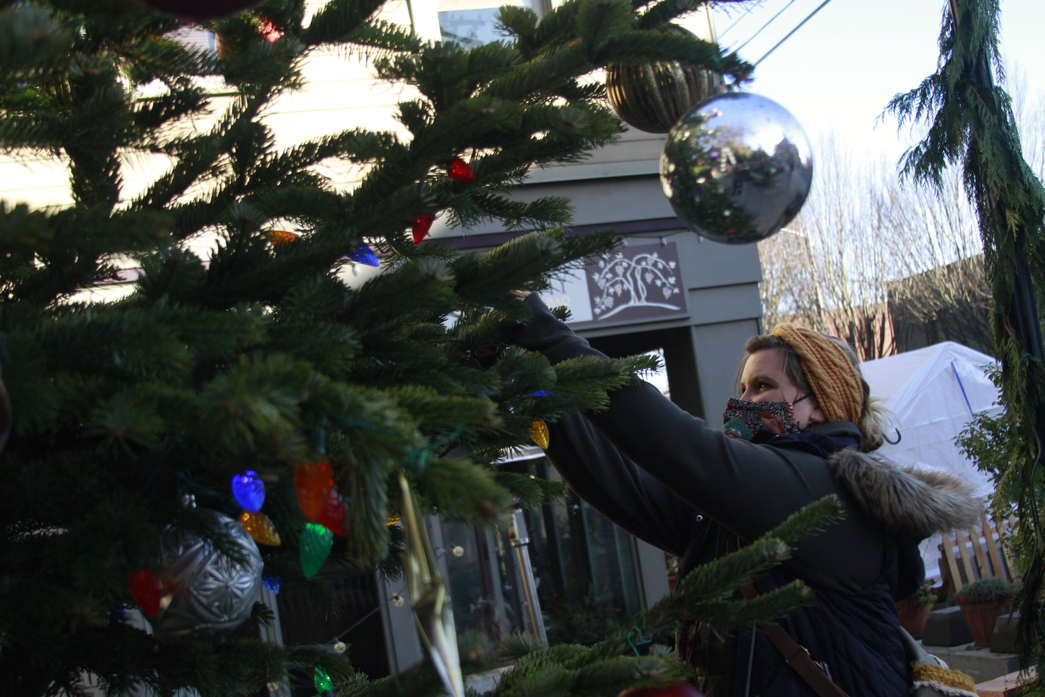 A contingent of Port Townsend Main Street Program decorators were hard at work downtown early last week, putting up and adorning the community Christmas tree at Haller Fountain.