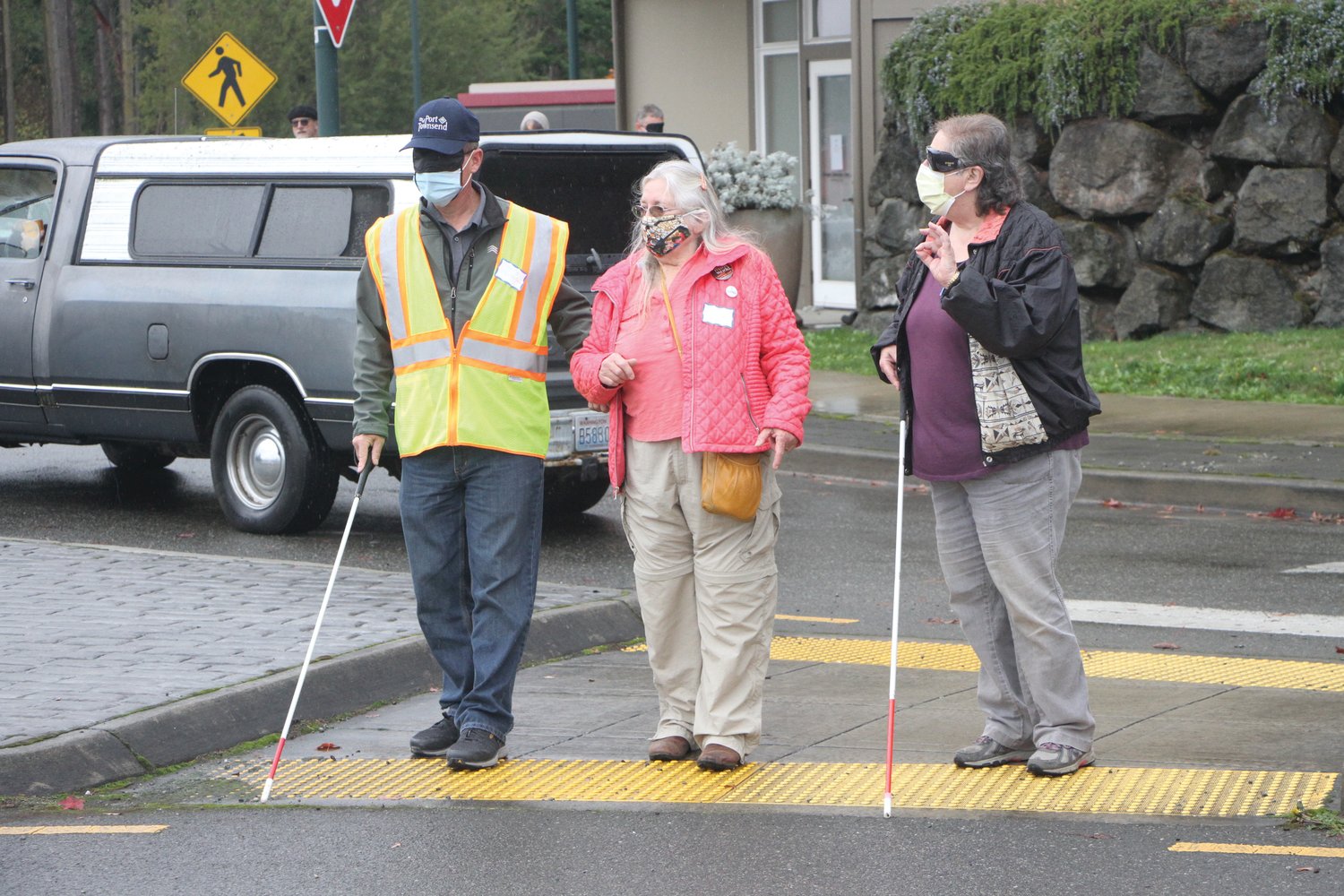 Port Townend Public Works Director Steve King is guided along a roundabout by DASH President Pat Teal during the organization’s simulation of crossing a roundabout while visually impaired on Oct. 29.