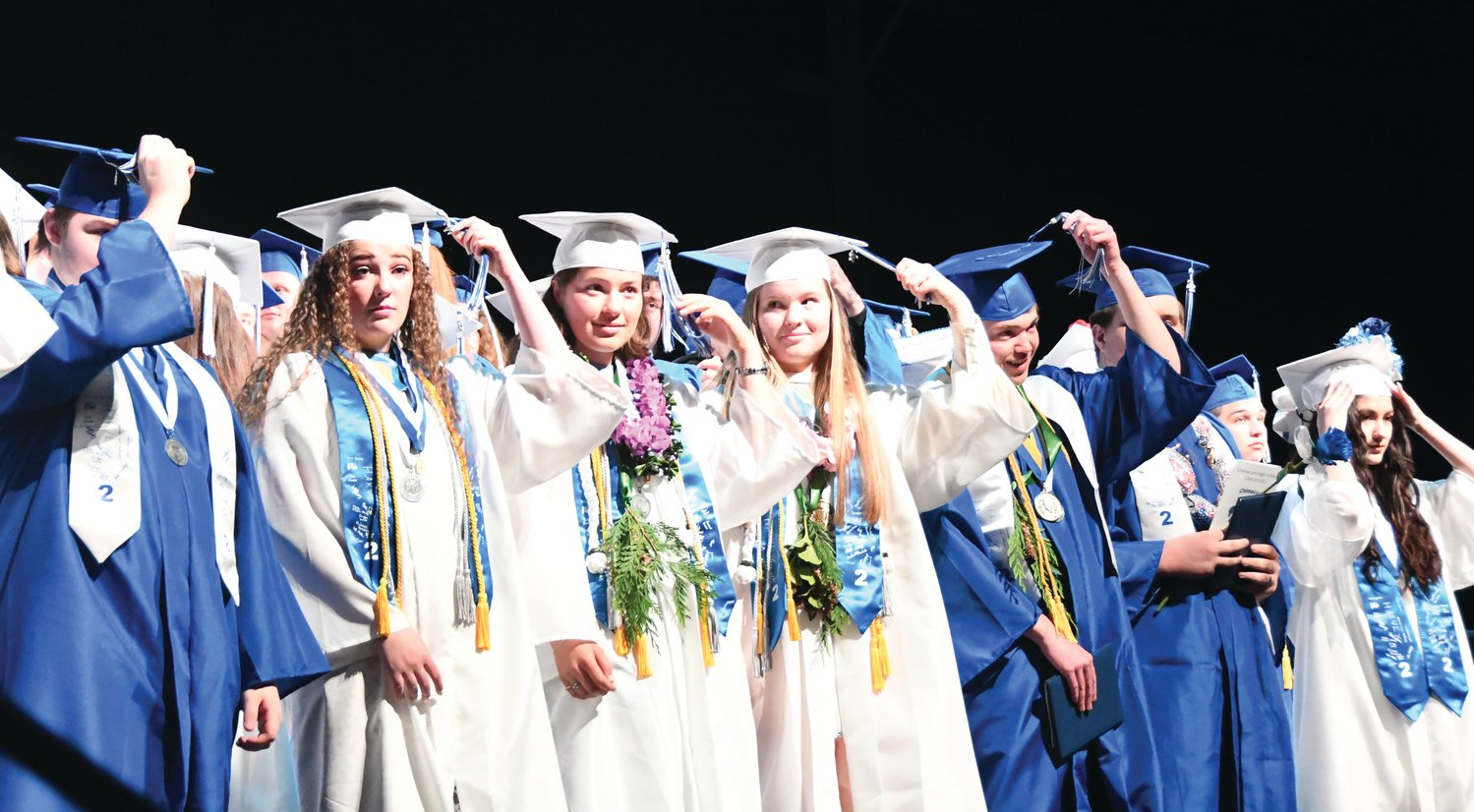 The graduating seniors turn the tassel as they eagerly anticipate the next chapter of life.