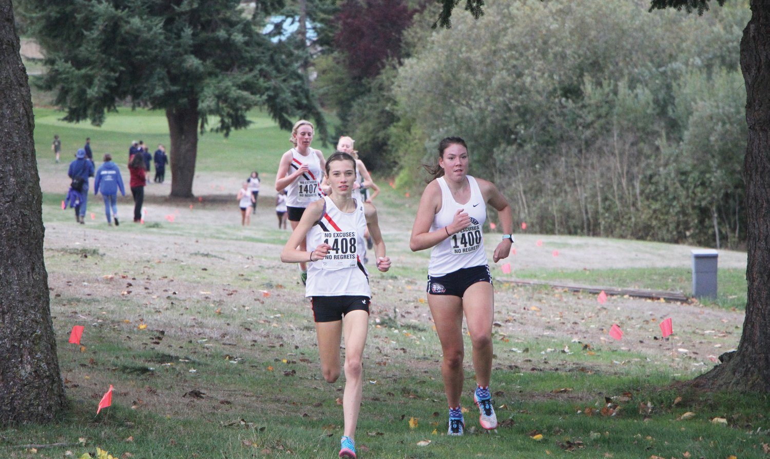 Rivals runners race around the Port Townsend Golf Course in 2021's annual meet in Port Townsend.