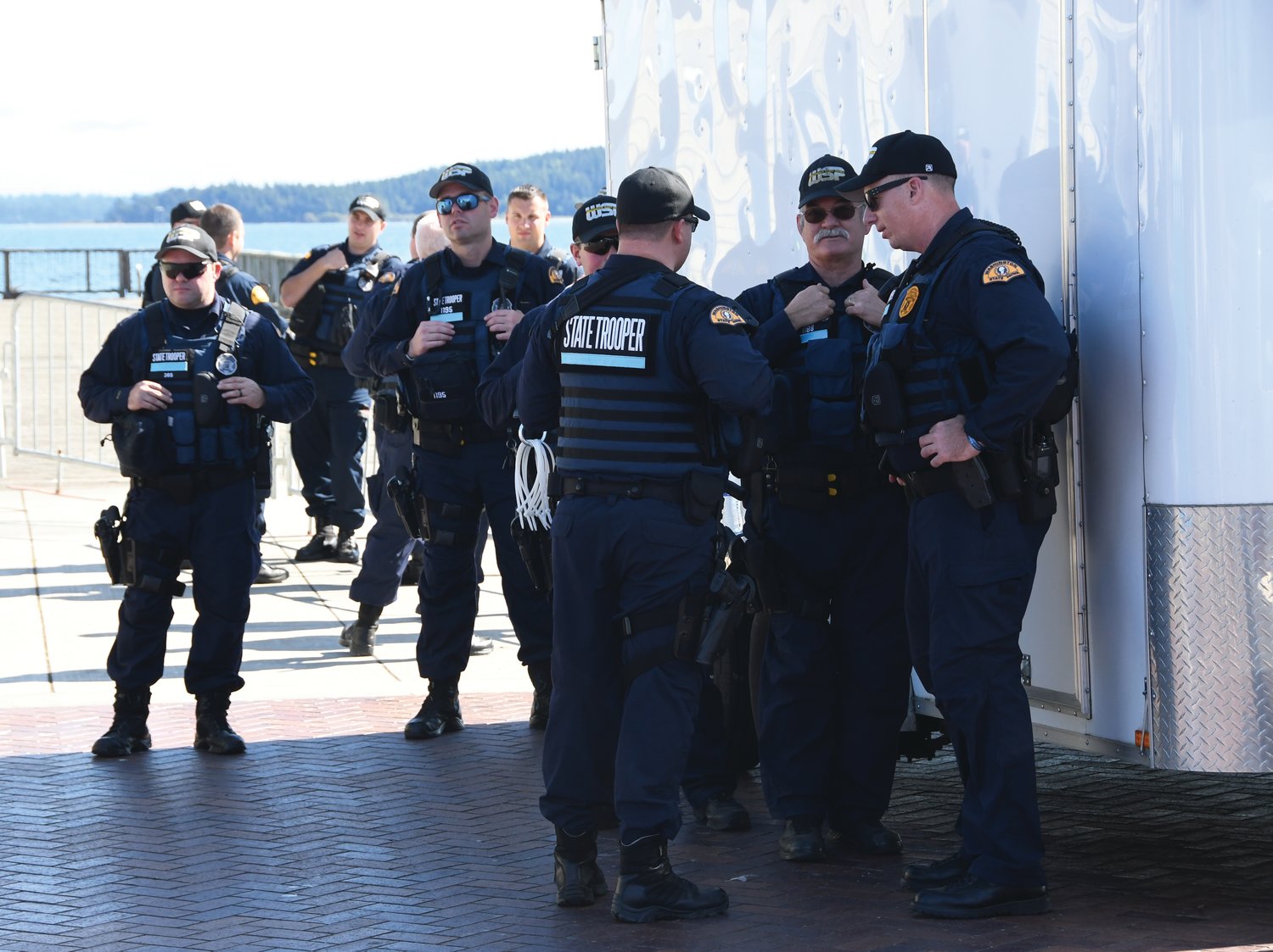 Around 30 or 40 members of law enforcement were visible around Pope Marine Park monitoring the protest.