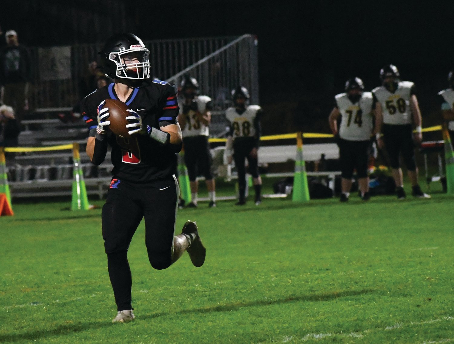 EJ's Aaron Glanz prepares to throw the ball during a two-point conversion in the first half.