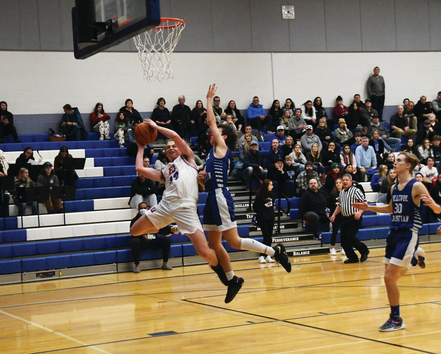 Rivals senior Michael Petta shoots a contested layup in the first half versus the Bellevue Christian Vikings.