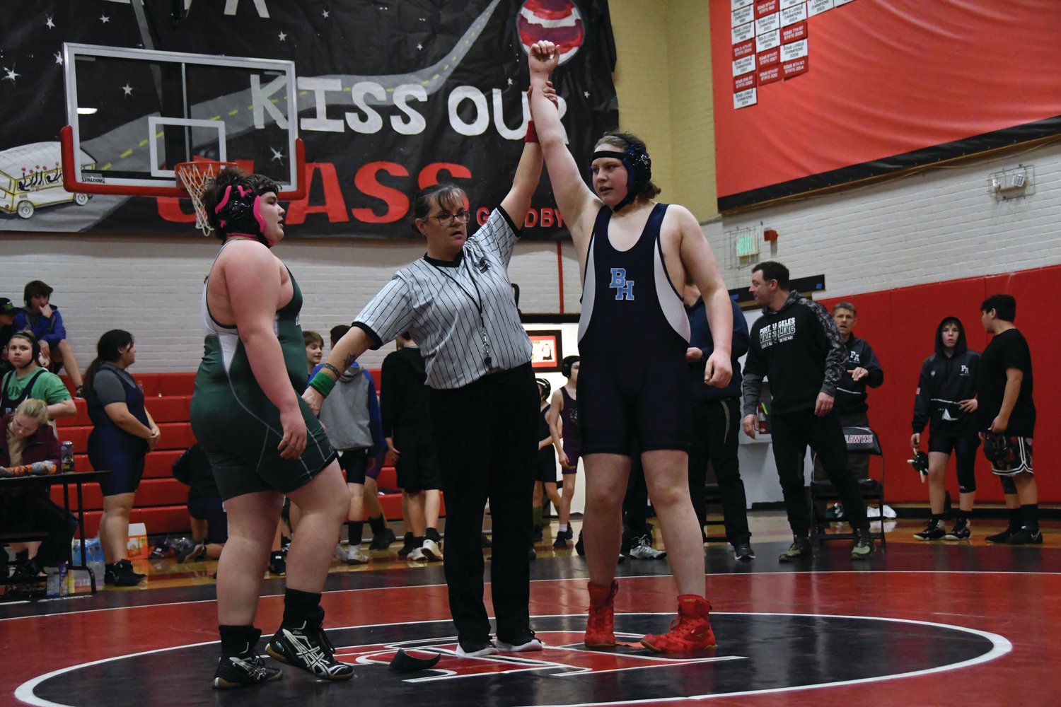 Oliver Ingersall, a Chimacum eighth-grader, is declared the victor after pinning his Port Angeles peer.
