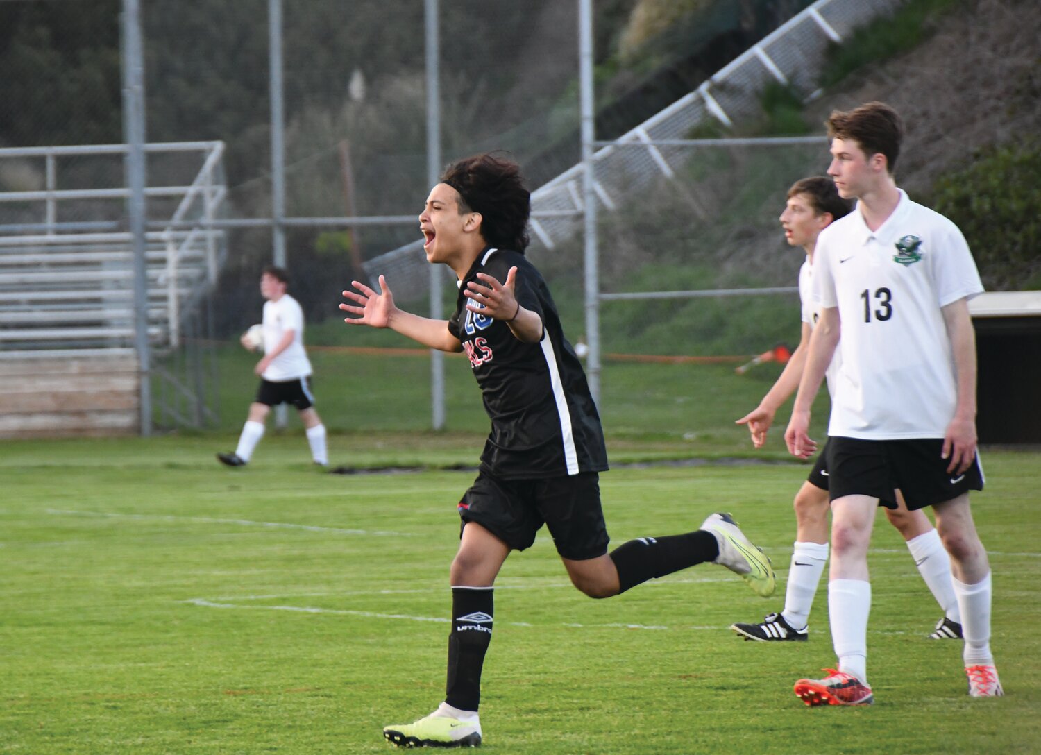 Freshman winger Armando Sanchez screams in celebration following his perfectly-aimed header goal in the first half.