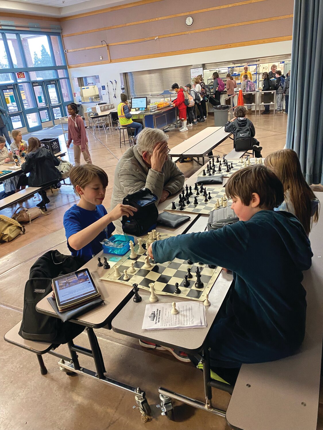 Middle schoolers at Blue Heron play a few games of chess during lunchtime as part of the newly-formed Blue Heron Middle School Chess Club, which started up in the fall.